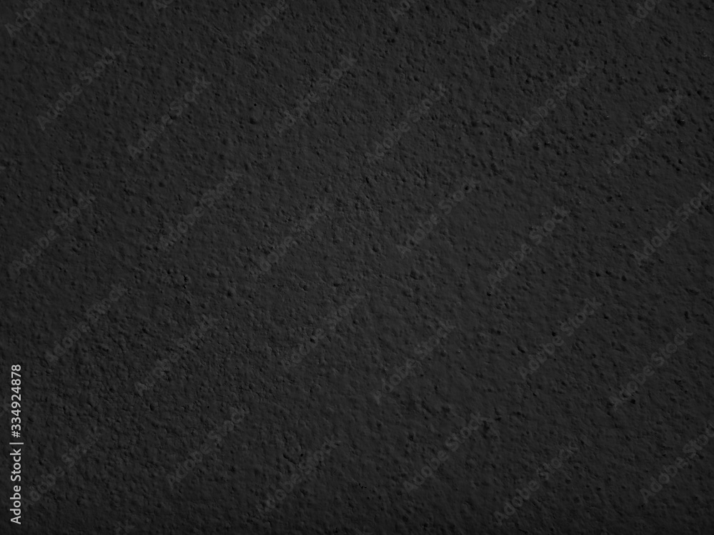 Black concrete abstract texture background. Dark backdrop. use design for product display or montage, advertising, food, beverages, technology, business, scary, horror, halloween. Top view