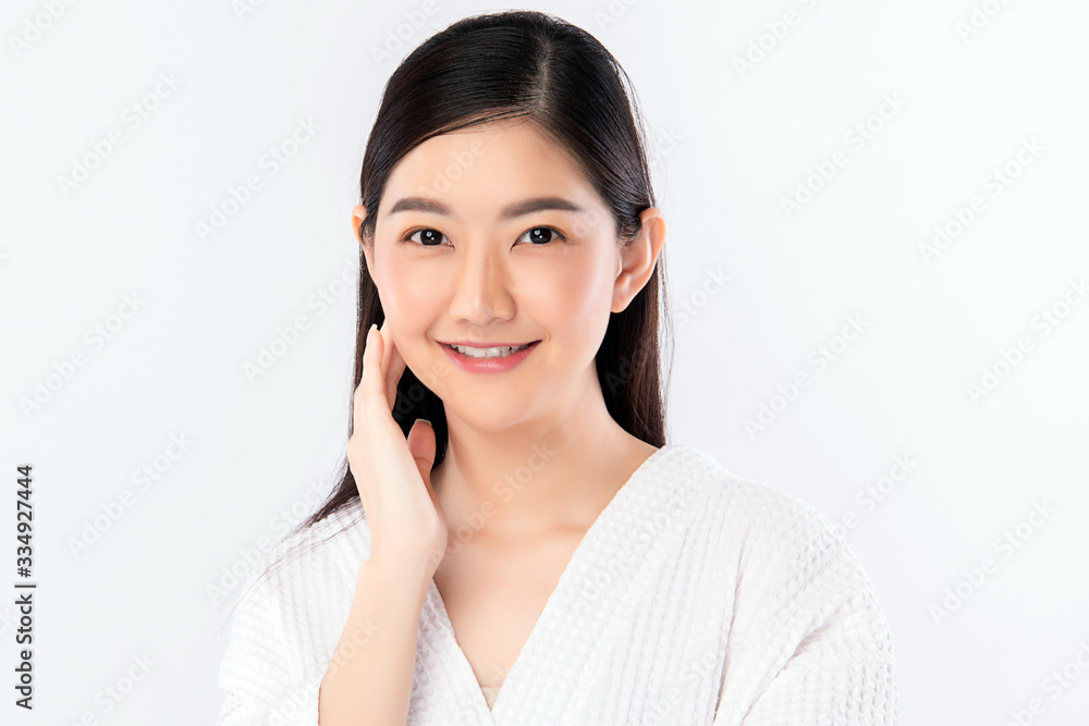Beautiful Young Asian Woman with Clean Fresh Skin. Face care, Facial treatment, Cosmetology, beauty and healthy skin and cosmetic concept, woman beauty skin isolated on white background Beautiful Young Asian Woman with Clean Fresh Skin. Face care, Facial treatment, Cosmetology, beauty and healthy skin and cosmetic concept, woman beauty skin isolated on white background