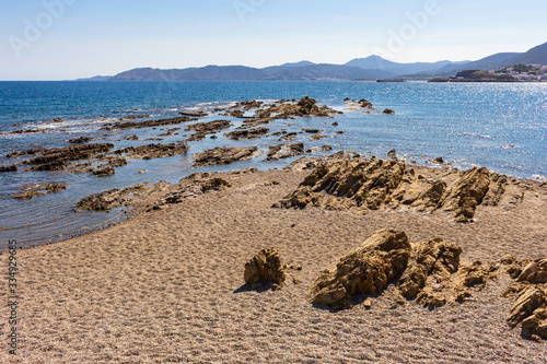 View of the Cros beach from the coastal road from Llansa to Colera. Costa Brava, Catalonia, Spain photo