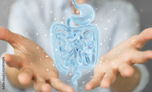 Photographie Woman using digital x-ray of human intestine holographic scan projection 3D rend