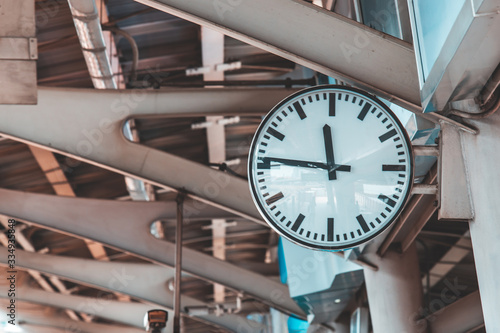 Clock at BTS train Station. on the day time.