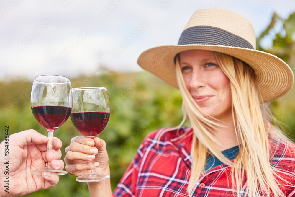 Woman drinking red wine at wine tasting in the vineyard Stock Photo ...
