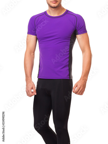 Аthlete in a purple sports t-shirt plays sports on a white background