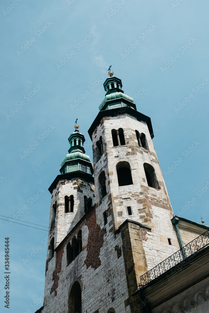 Old churches towers on the blue sky