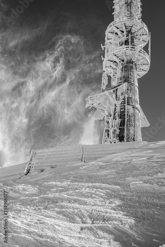 Snowy tower on mountain