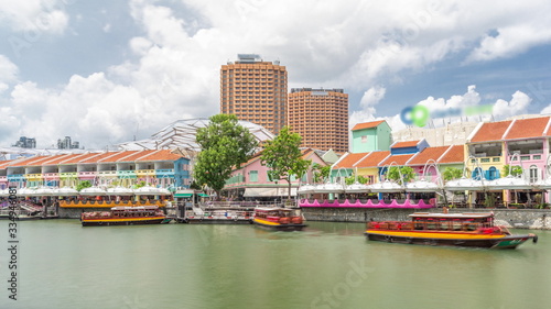 Photography Tourist boats docking at Clarke Quay habour timelapse hyperlapse.