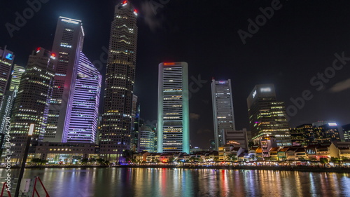 Photography Singapore quay with tall skyscrapers in the central business district on Boat Qu