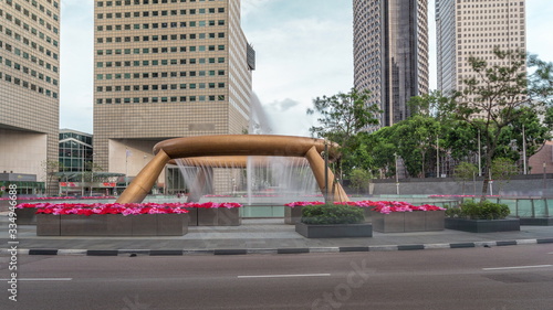 Photography The Fountain of Wealth with skyscrapers timelapse hyperlapse and is recognized as the largest fountain