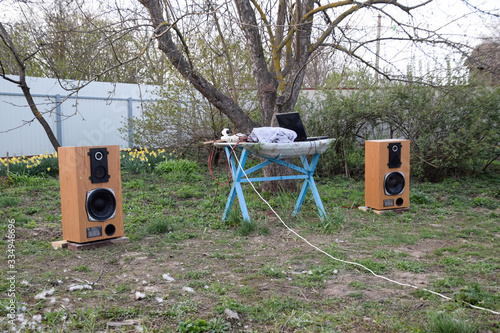 Acoustic system Amphiton 35as-018. Music speakers in garden outdoors, listening to music. photo