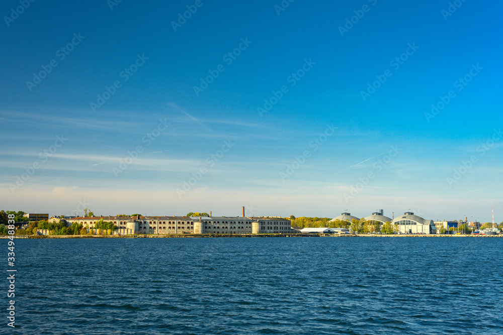 Panoramic view of a city of Tallinn, Estonia from the sea. Patarei prison and Seaplane Harbour Maritime museum in Kalamaja.