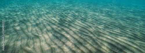 Ripples in the sand underwater on the seabed  natural scene  Mediterranean sea