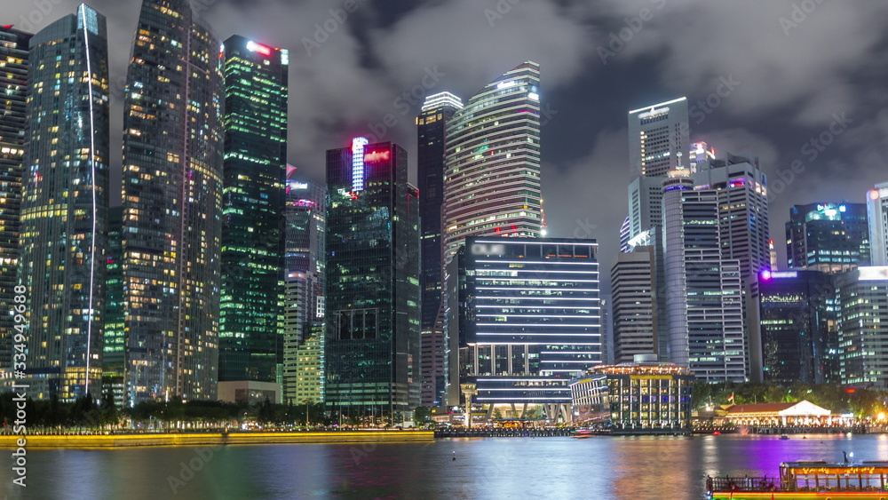 Business Financial Downtown City and Skyscrapers Tower Building at Marina Bay night timelapse hyperlapse, Singapore