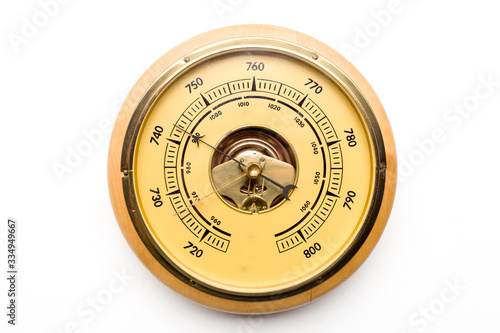Foto Vintage style barometer isolated on white wall background