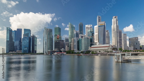 Business Financial Downtown City and Skyscrapers Tower Building at Marina Bay timelapse hyperlapse, Singapore, © neiezhmakov