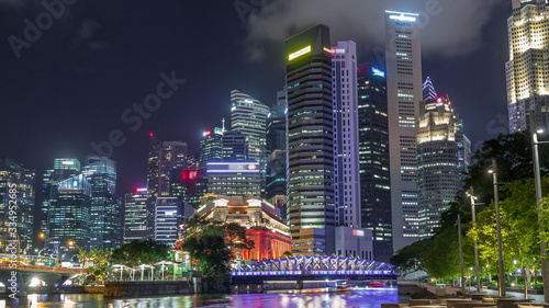Business Financial Downtown City and Skyscrapers Tower Building at Marina Bay night timelapse hyperlapse, Singapore