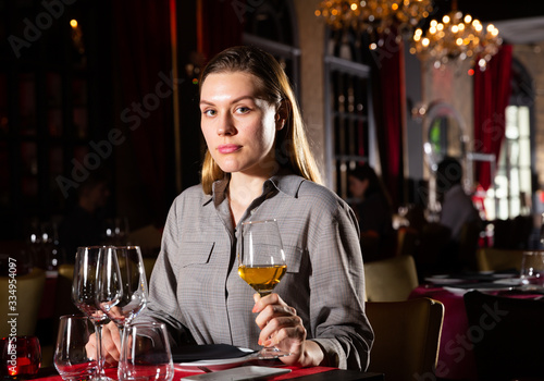 Woman with glass of wine