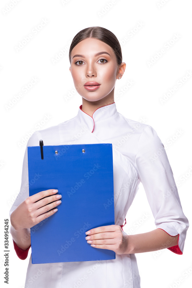 Beauty female doctor holding a clipboard. Woman with a serious face isolated on white background Beauty female doctor holding a clipboard. Woman with a serious face isolated on white background