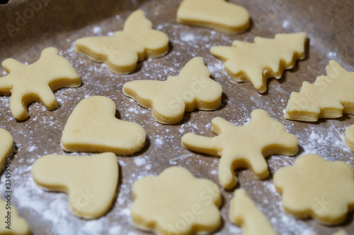 cooking homemade delicious cookies of different figures from the dough