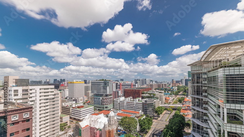 Photography Singapore skyline with Victoria street and National Library aerial timelapse