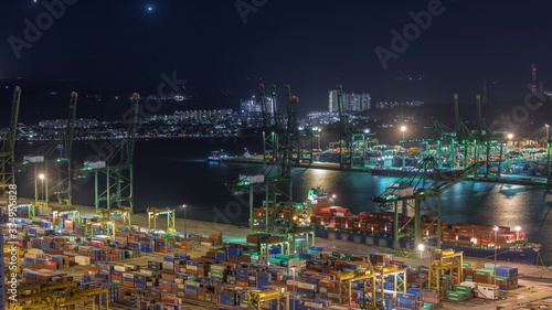 Commercial port of Singapore aerial night timelapse. © neiezhmakov