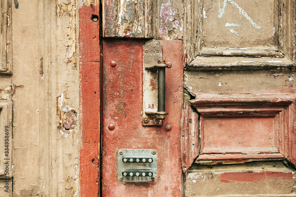 Close up of wooden weathered door with rusty and lock Close up of wooden weathered door with rusty and lock