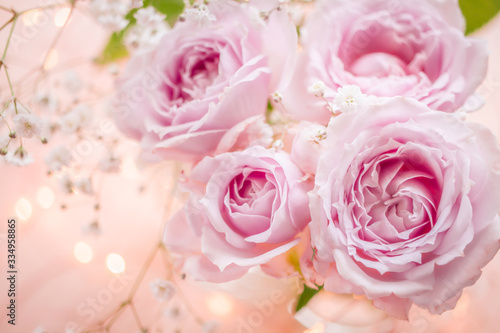 淡いピンクのバラ 花のキラキラの背景