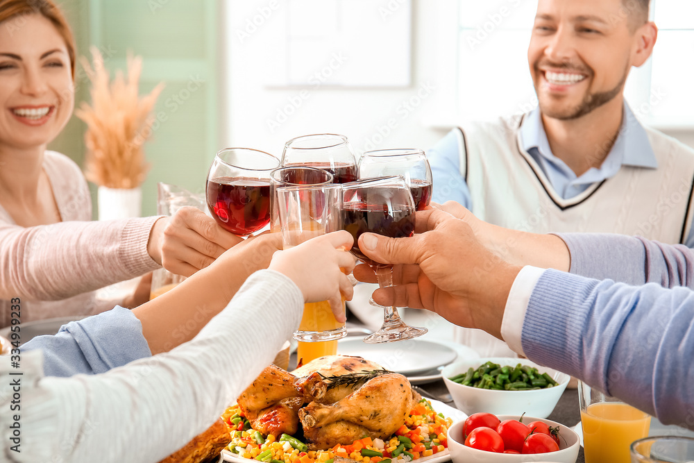 Family celebrating Thanksgiving Day at home Family celebrating Thanksgiving Day at home