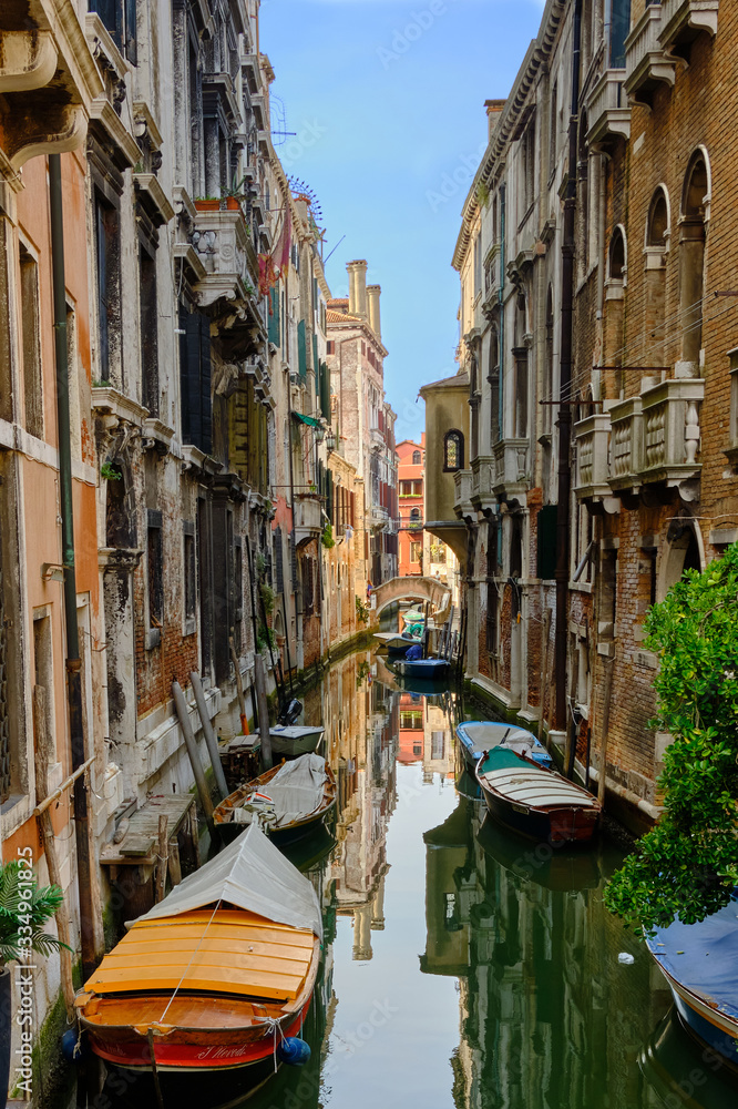 Some ships in a canal in Venice