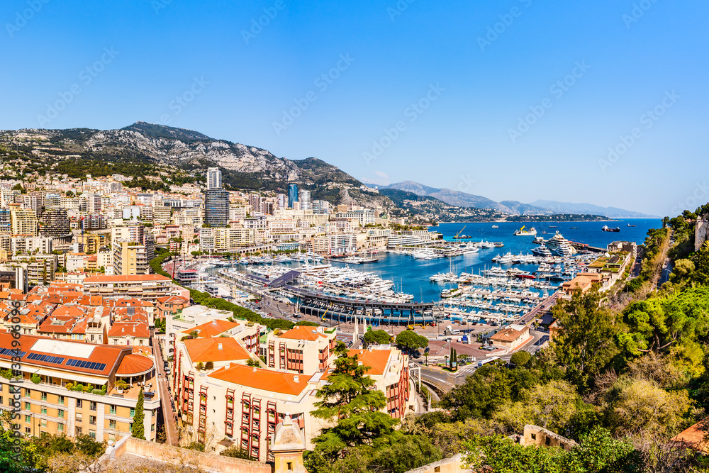 Monaco skyline view of the Hercules port with buildings roof tops and multiple yachts on the Cote d'Azur French riviera