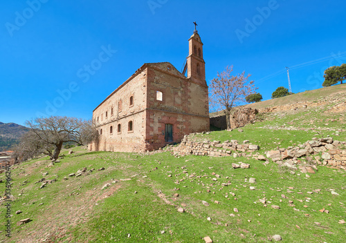 Landscape view of the abandoned mining town of Minas del Horcajo with the ruins of the San Juan Bautista church in the foreground, Almodovar del Campo, Ciudad Real province, Castilla la Mancha, Spain photo