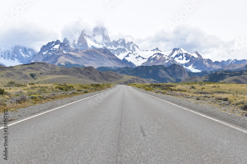 Street to Glacier National Park in El Chalten, Argentina, Patagonia with snow covered Fitz Roy Mountain in background © places-4-you