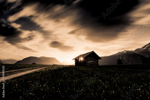 Little hut in Austria during sunset