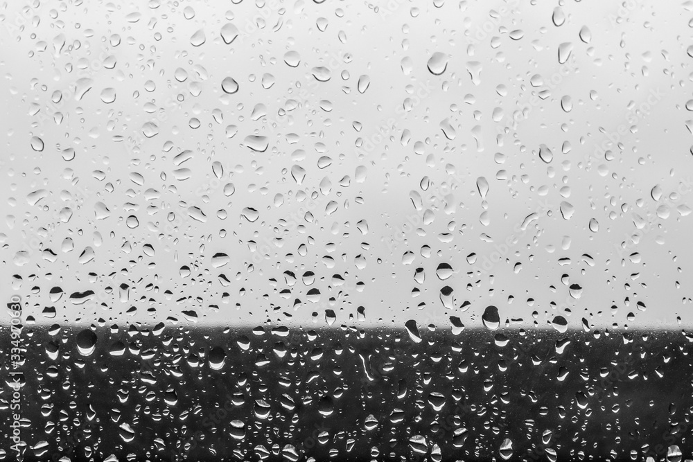 Spring rain. May thunderstorm. Raindrops on the glass. The texture of the drops. Wet window. Chill day. Inclement weather. Torrential rain. View of the world from the window. Spring rain. May thunderstorm. Raindrops on the glass. The texture of the drops. Wet window. Chill day. Inclement weather. Torrential rain. View of the world from the window.
