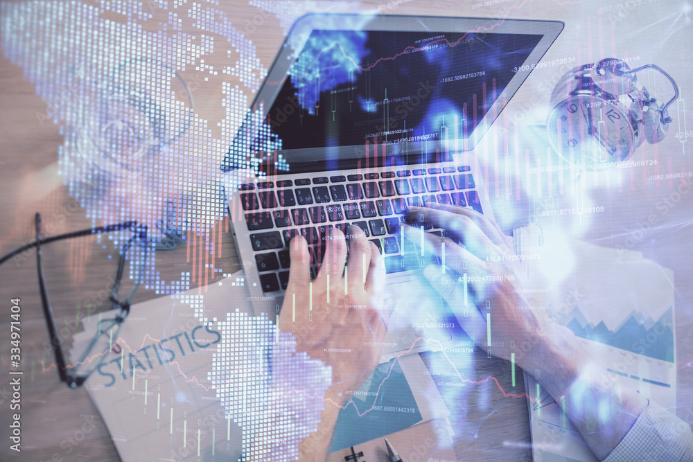 Multi exposure of forex graph with man working on computer on background. Concept of market analysis. Multi exposure of forex graph with man working on computer on background. Concept of market analysis.