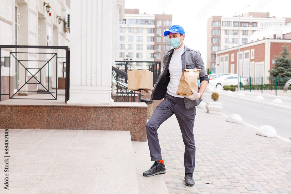 food delivery man in protective mask