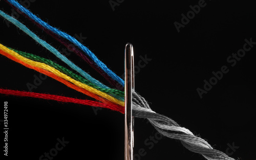 Fotografia, Obraz bright iridescent thread floss for embroidery and needlework