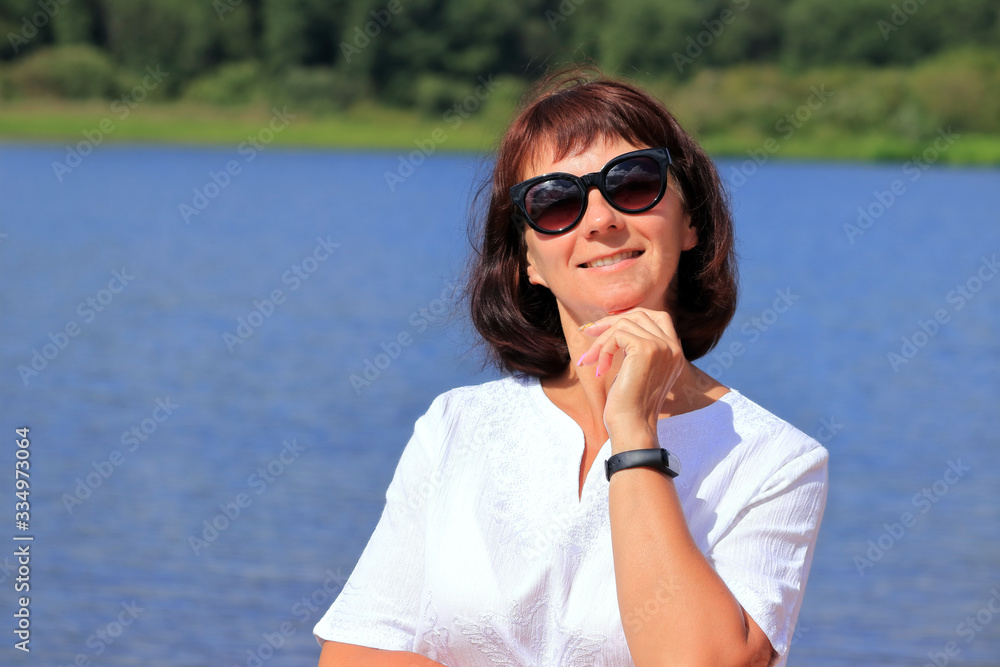 woman on the beach in a white dress woman on the beach in a white dress