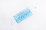 Medical blue mask for protection against coronavirus or Covid-19. On a white isolated background