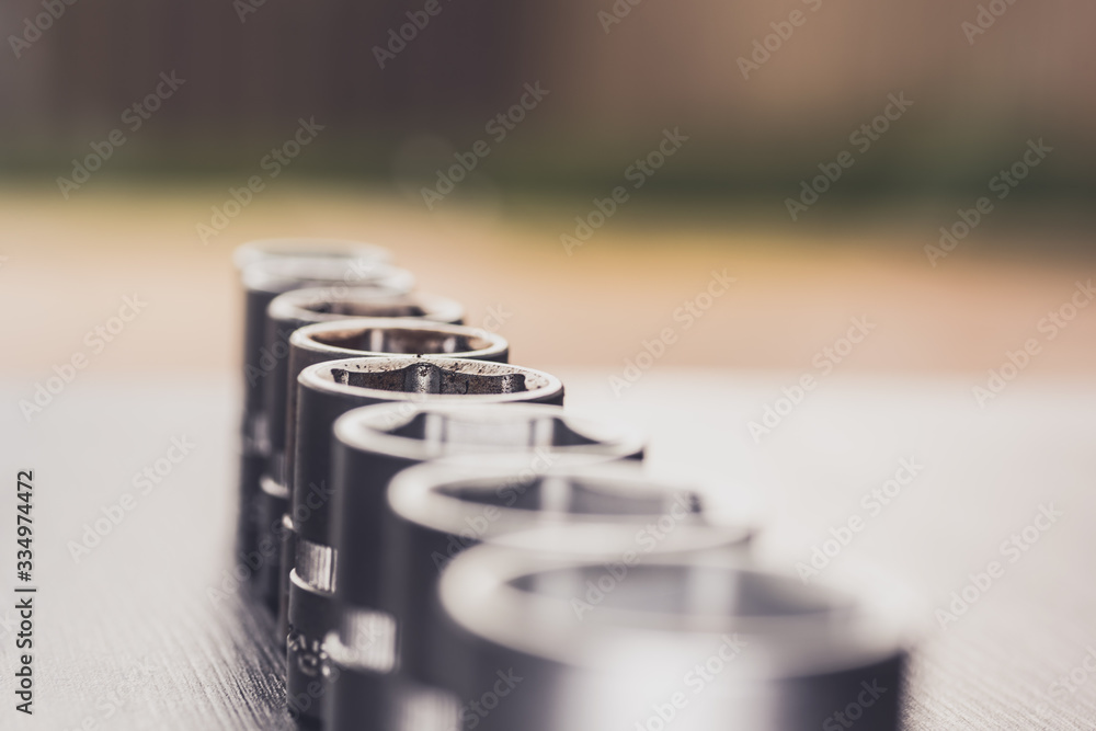 Set of socket wrenches - useful tool in a garage and workshop Set of socket wrenches - useful tool in a garage and workshop