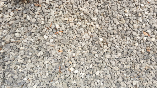 stone background, dark gravel pebbles stone texture
