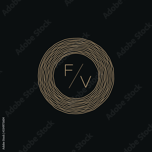 Graphic vector illustration of two letters F and V inside the tree rings