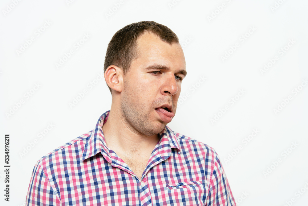 Man shows tongue Man shows tongue