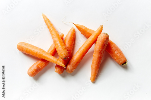 carrots on white background top view