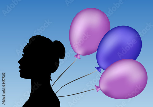 Silhouette of a woman in profile with balloons on a blue background