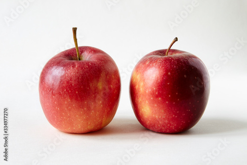 two red apples on white Infinity cove background