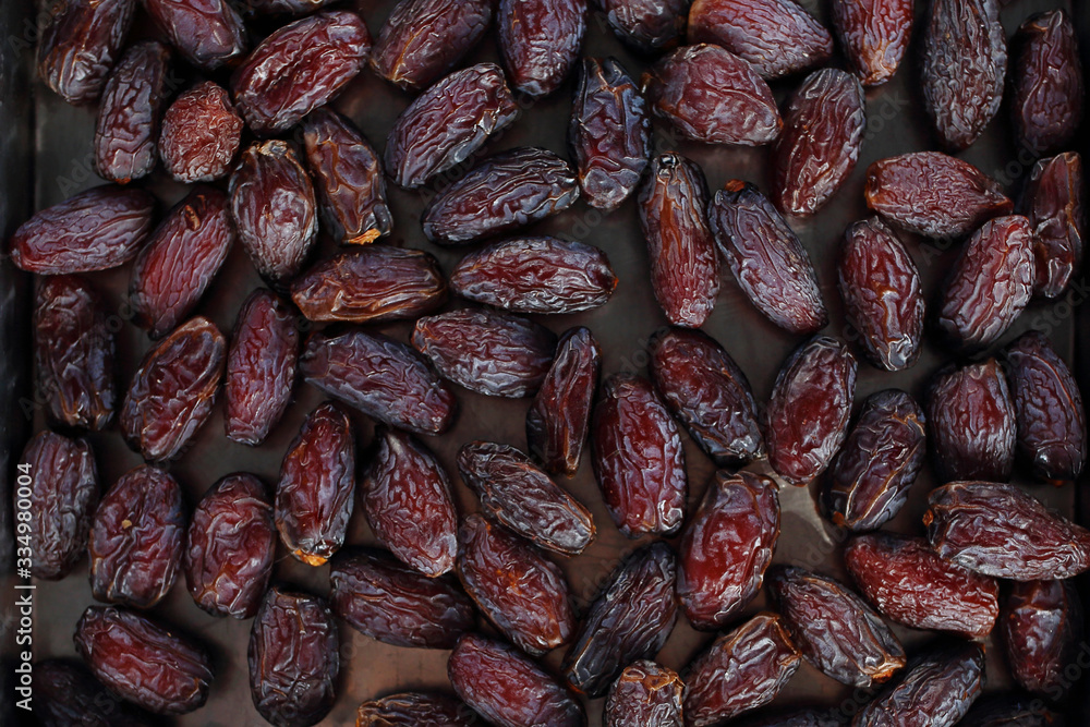 Obraz premium Dates. Natural background with ripe fruit