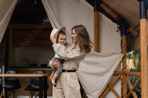 mother plays with baby 