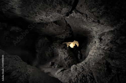 man in cave, mysterious dar...
