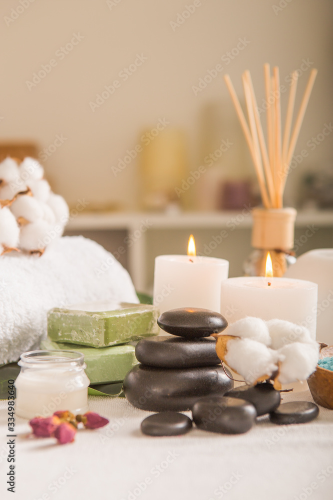 Zen and relax concept. Spa composition with treatment on light background - space for text Zen and relax concept. Spa composition with treatment on light background - space for text
