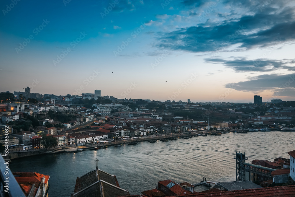 Porto, Região Norte/Portugal - September 16 2019 : Sunset on Douro river and the city of Porto.